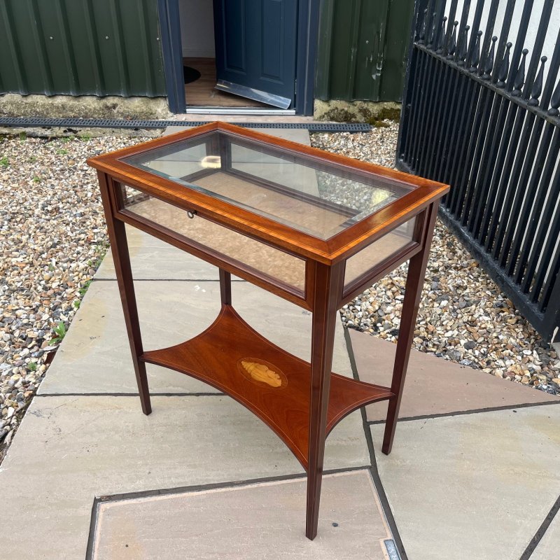 An Edwardian Period mahogany inlaid bijouterie cabinet.